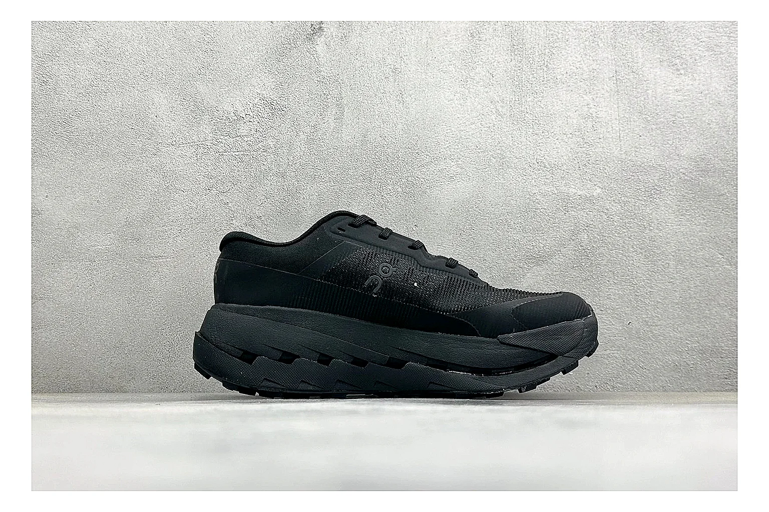 On Cloudmonster Triple Black shopping brief photo showing triple black running upper, oversized CloudTec pod sole, tonal laces, and rounded performance shape thumbnail 4