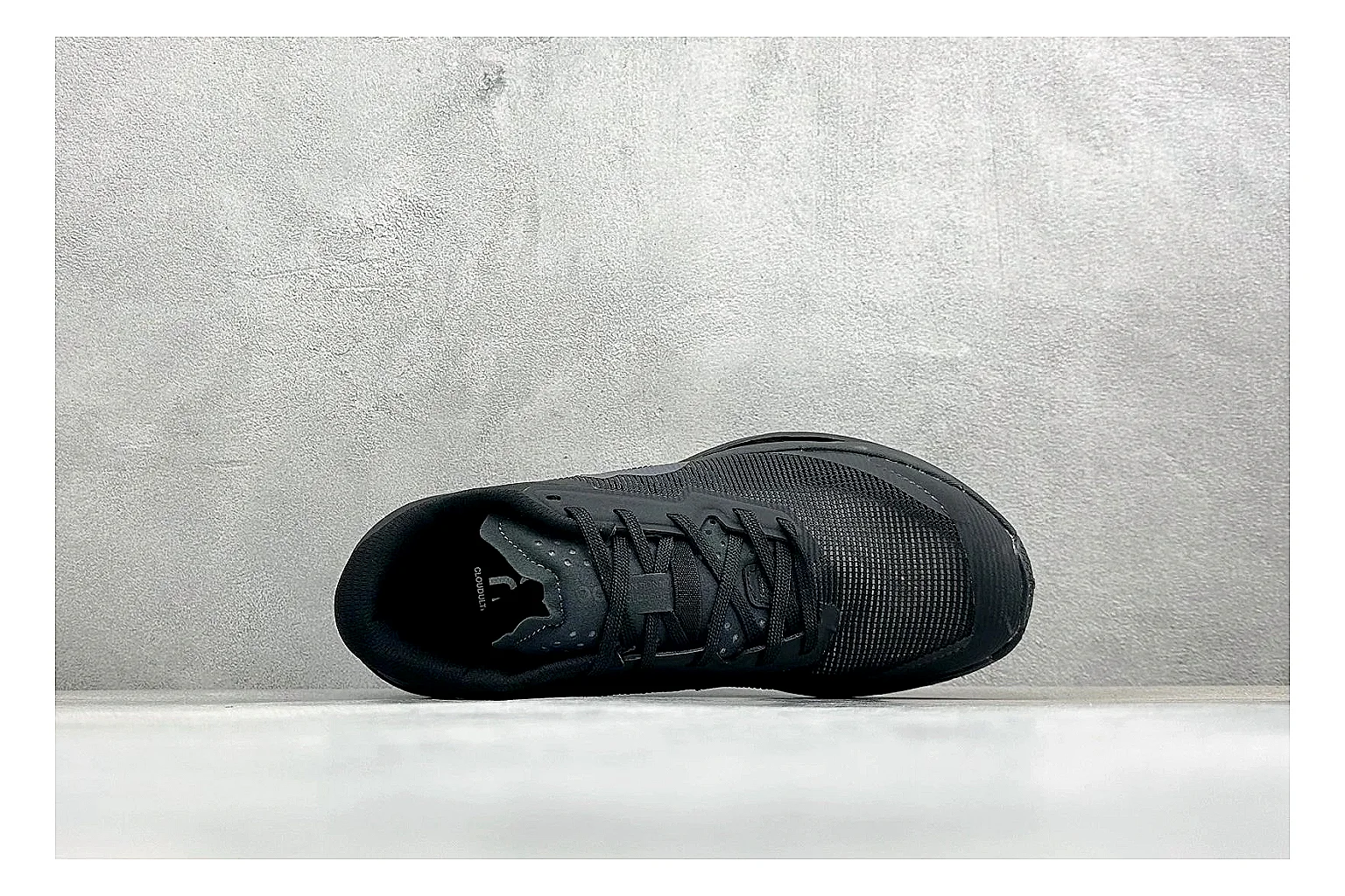 On Cloudmonster Triple Black shopping brief photo showing triple black running upper, oversized CloudTec pod sole, tonal laces, and rounded performance shape thumbnail 5