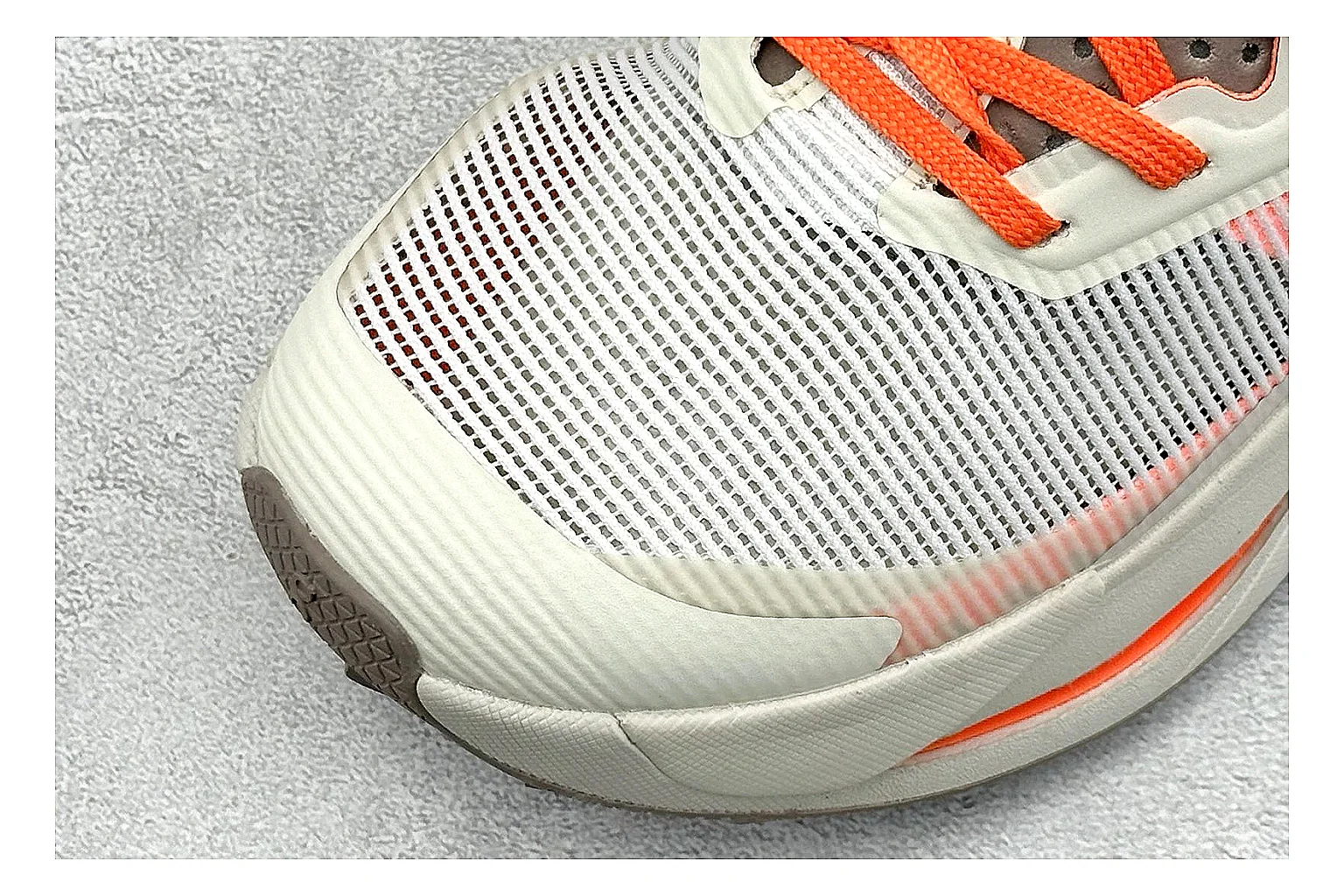 On Cloudmonster White Orange shopping brief photo showing white running mesh, orange accent hits, oversized CloudTec sole pods, and a rounded runner silhouette thumbnail 3