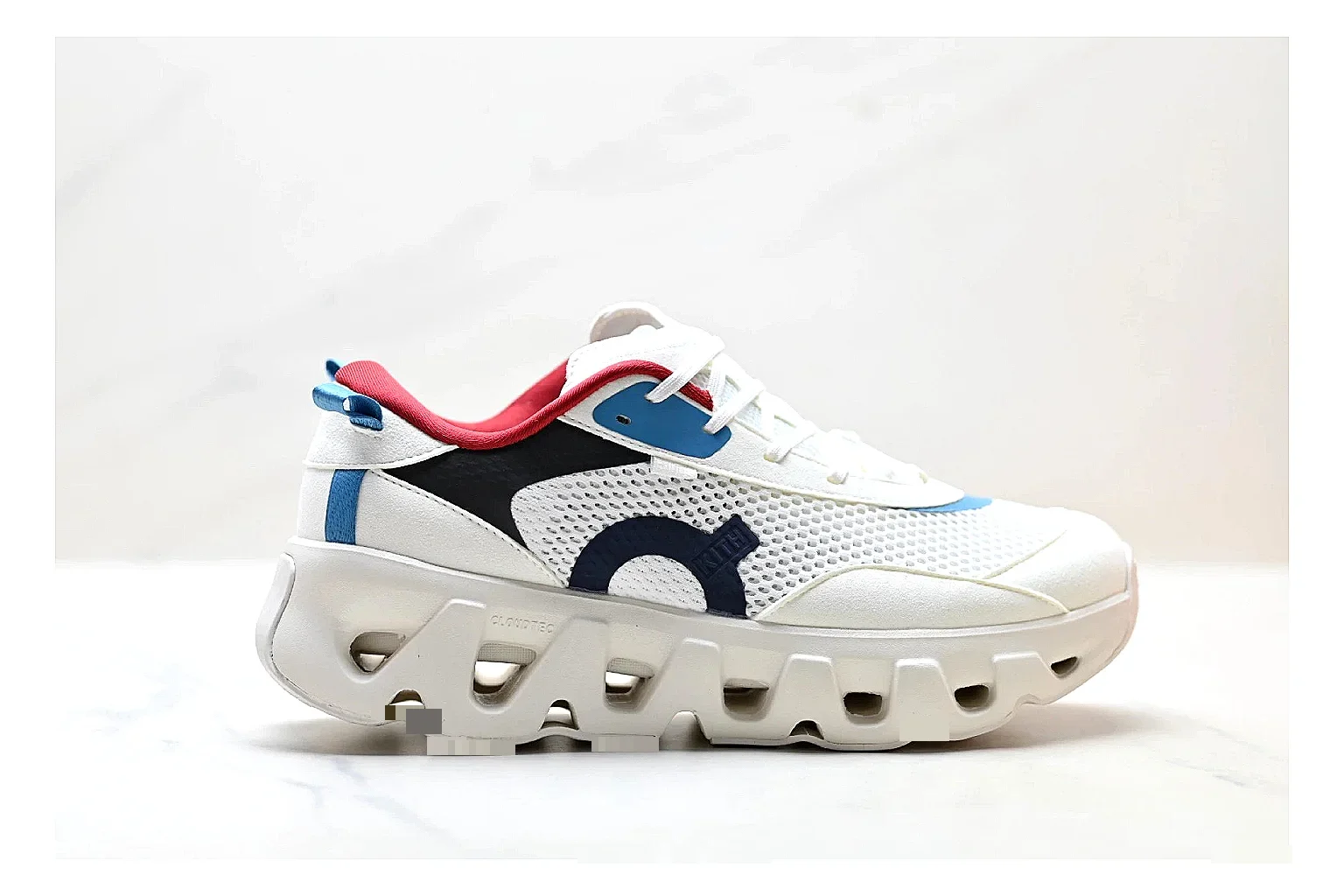 On Cloudswift K-Tech 2 White Blue Red Sneakers shopping brief image showing white blue red running sneakers with mesh texture, side-profile shape, upper panel lines, and outsole detail