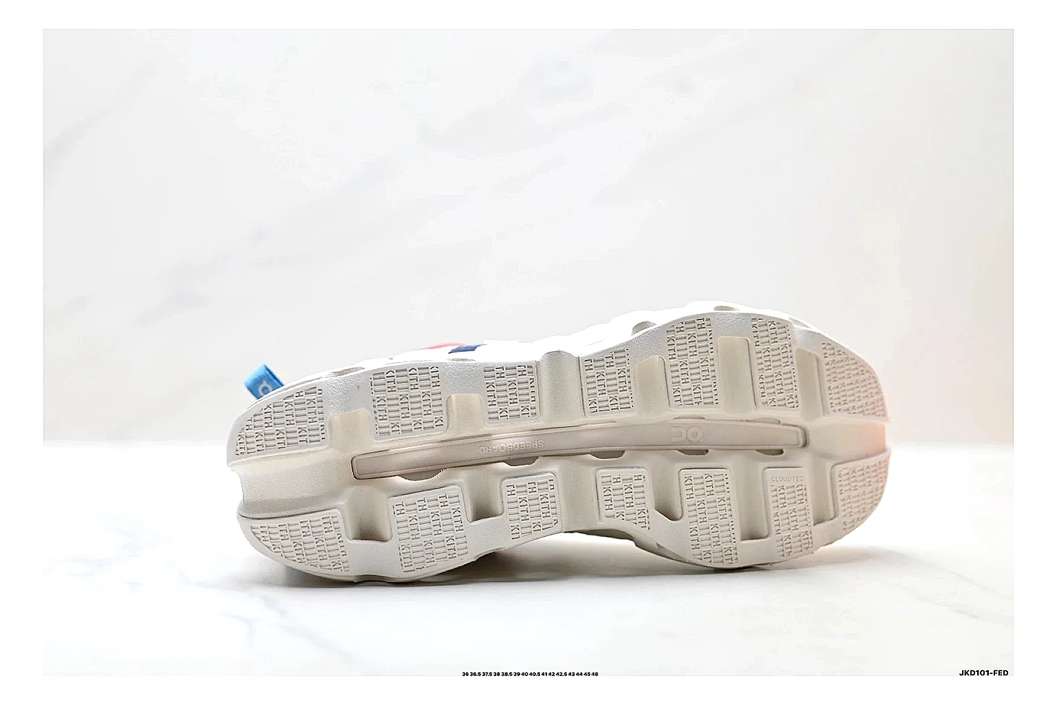 On Cloudswift K-Tech 2 White Blue Red Sneakers shopping brief image showing white blue red running sneakers with mesh texture, side-profile shape, upper panel lines, and outsole detail thumbnail 2