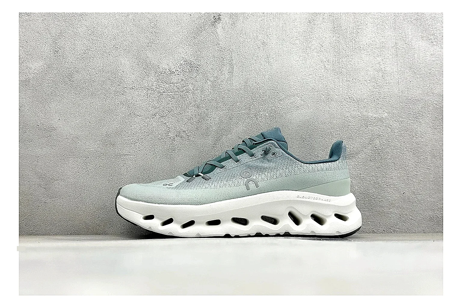 On Cloudtilt Mint shopping brief photo showing mint knit-style upper, smooth CloudTec sole, tonal laces, and rounded lifestyle runner shape