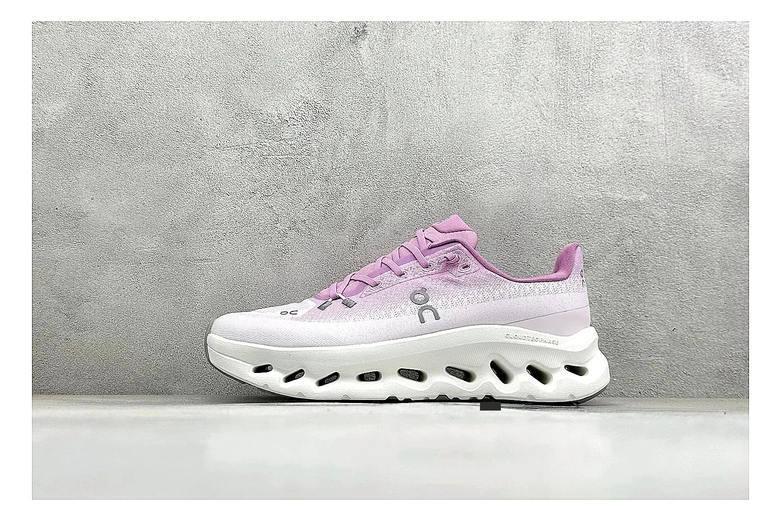 On Cloudtilt Pink shopping brief photo showing pink knit-style upper, smooth CloudTec sole, tonal laces, and rounded lifestyle runner shape