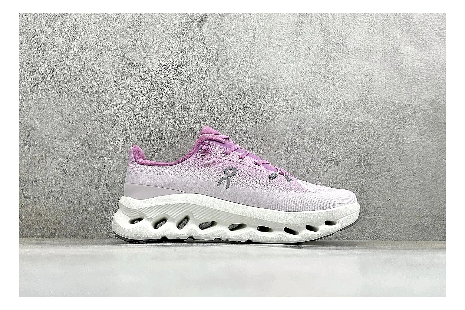 On Cloudtilt Pink shopping brief photo showing pink knit-style upper, smooth CloudTec sole, tonal laces, and rounded lifestyle runner shape thumbnail 4
