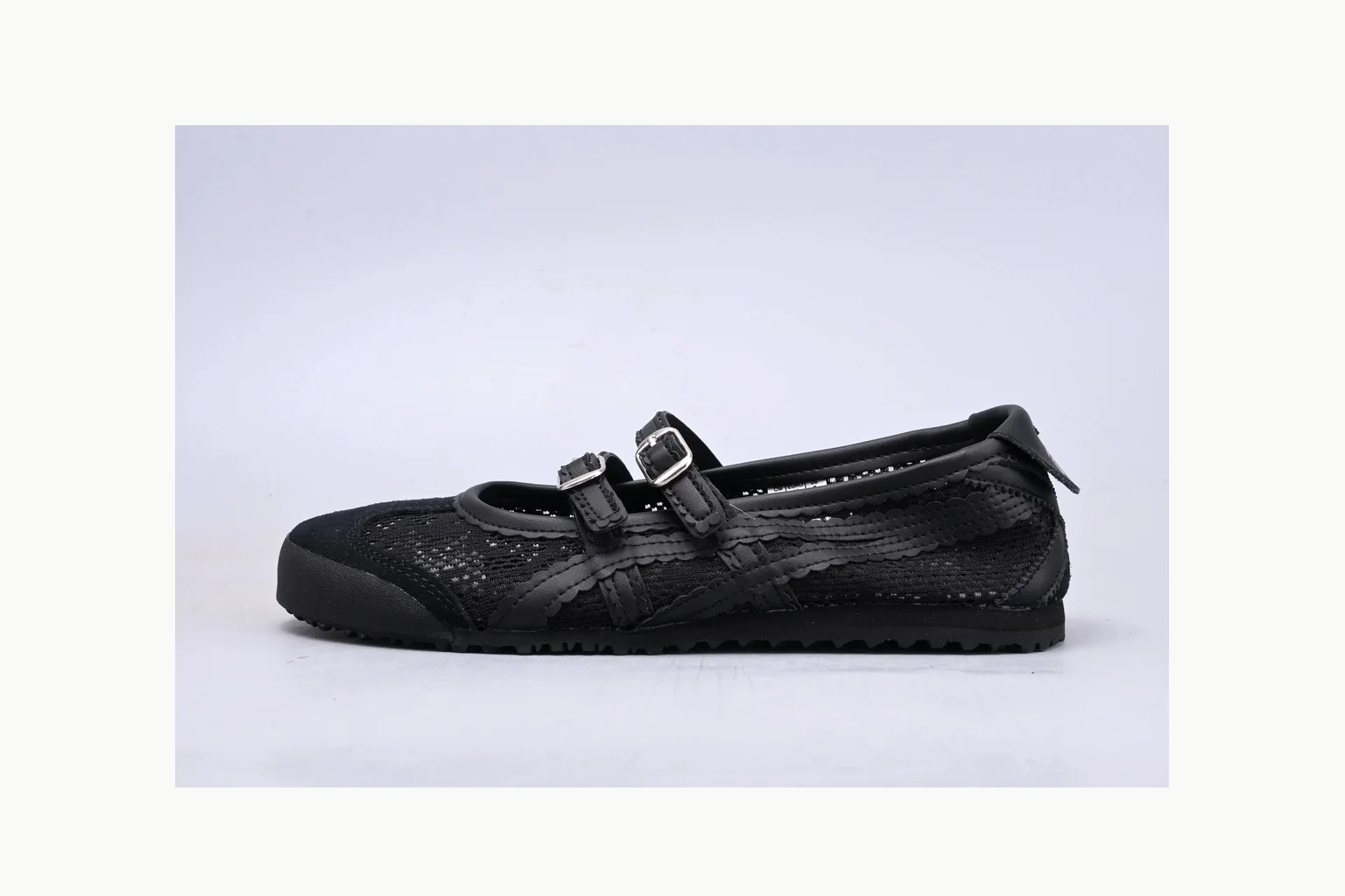 Onitsuka Tiger Black Leather Sneaker shopping brief image showing black black leather retro low-top with leather upper and low top shape
