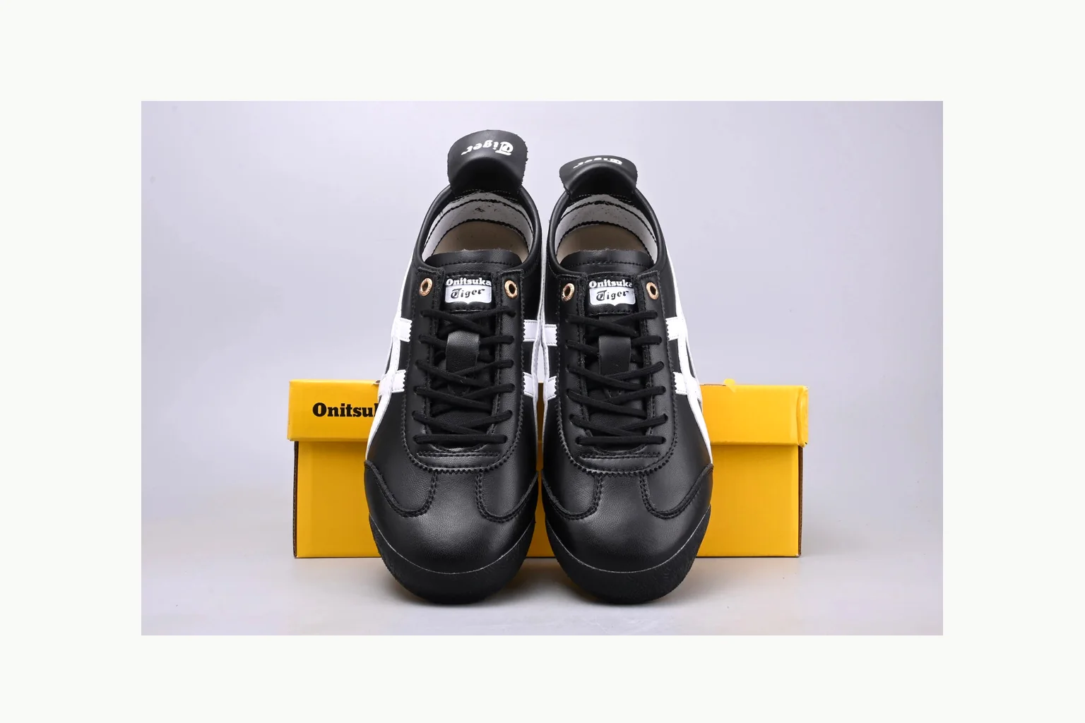 Onitsuka Tiger Black White Sneaker shopping brief image showing white black onitsuka tiger with mixed upper and low top shape thumbnail 2