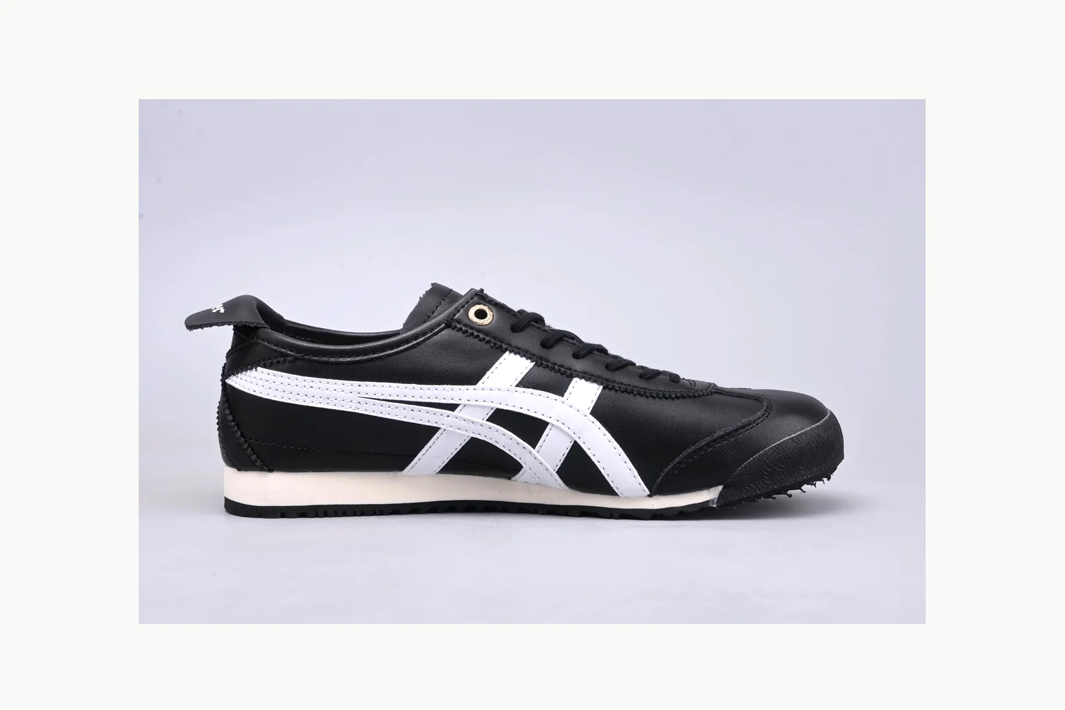 Onitsuka Tiger Black White Sneaker shopping brief image showing white black onitsuka tiger with mixed upper and low top shape thumbnail 4