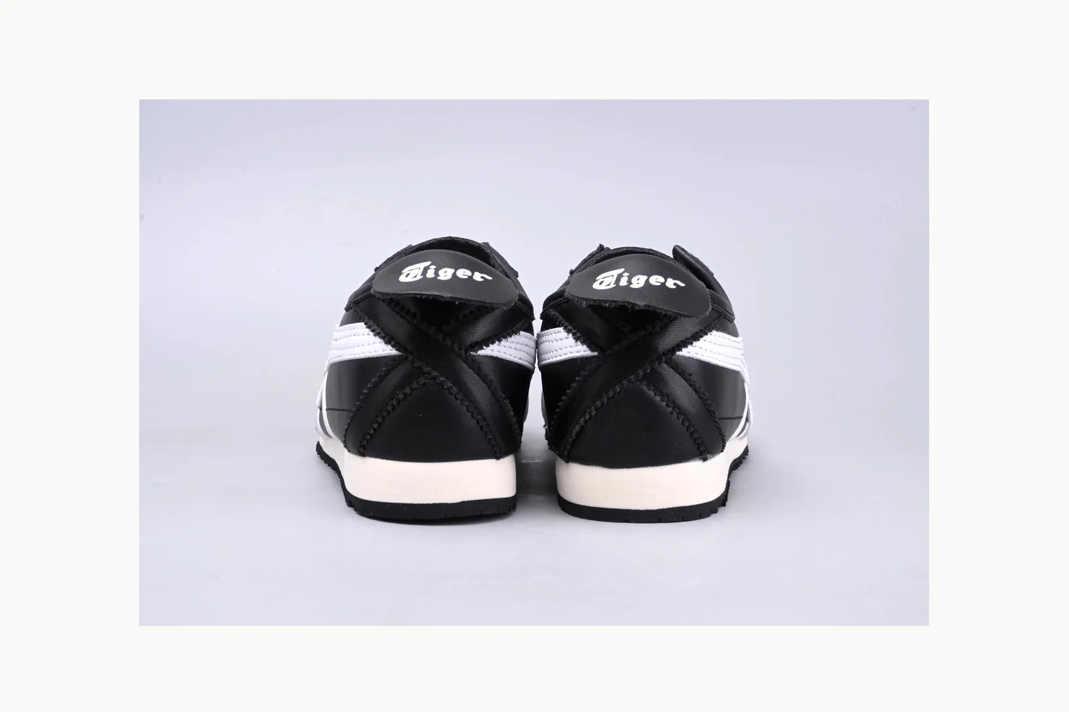Onitsuka Tiger Black White Sneaker shopping brief image showing white black onitsuka tiger with mixed upper and low top shape thumbnail 6