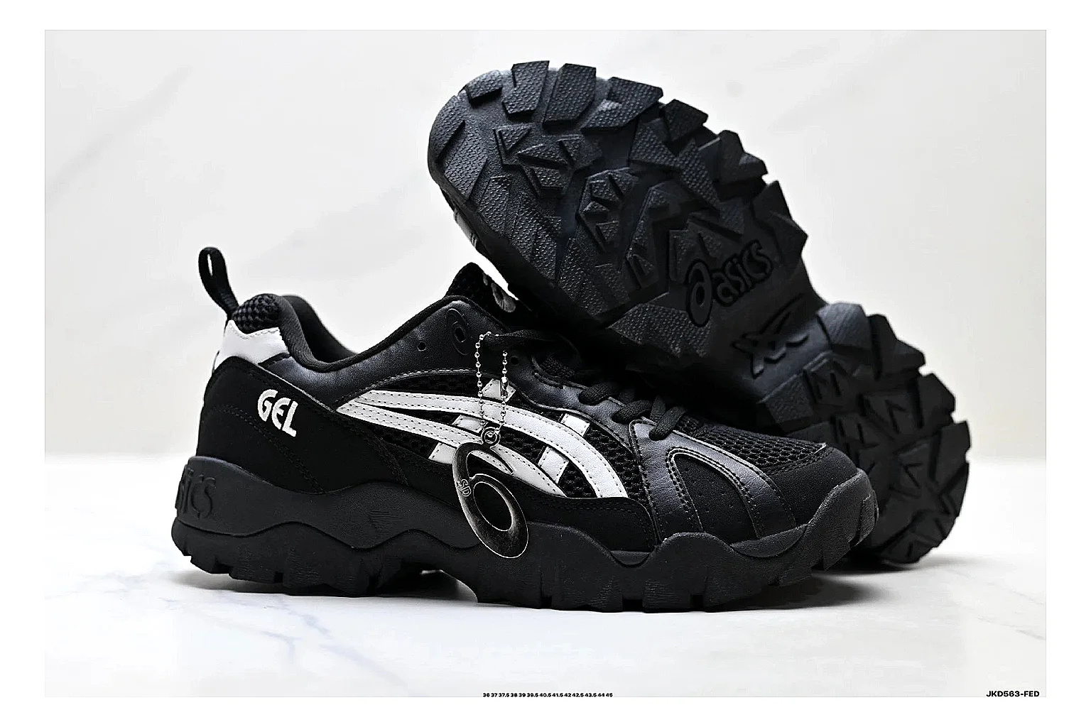 Onitsuka Tiger Gel-Tru Black White Sneakers shopping brief image showing black white trail runner sneakers with mesh-leather texture, side-profile shape, upper panel lines, and outsole detail thumbnail 3