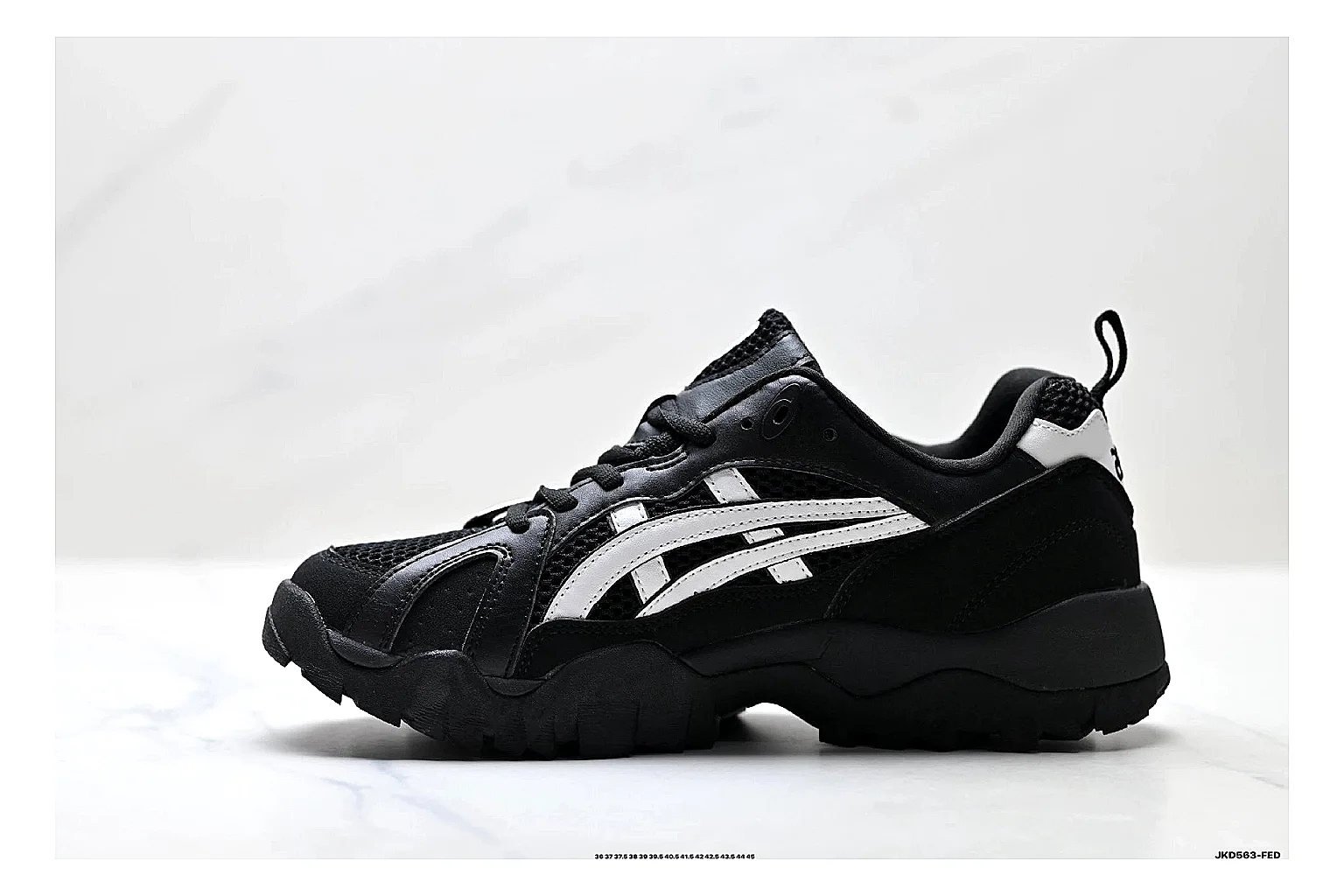 Onitsuka Tiger Gel-Tru Black White Sneakers shopping brief image showing black white trail runner sneakers with mesh-leather texture, side-profile shape, upper panel lines, and outsole detail thumbnail 4