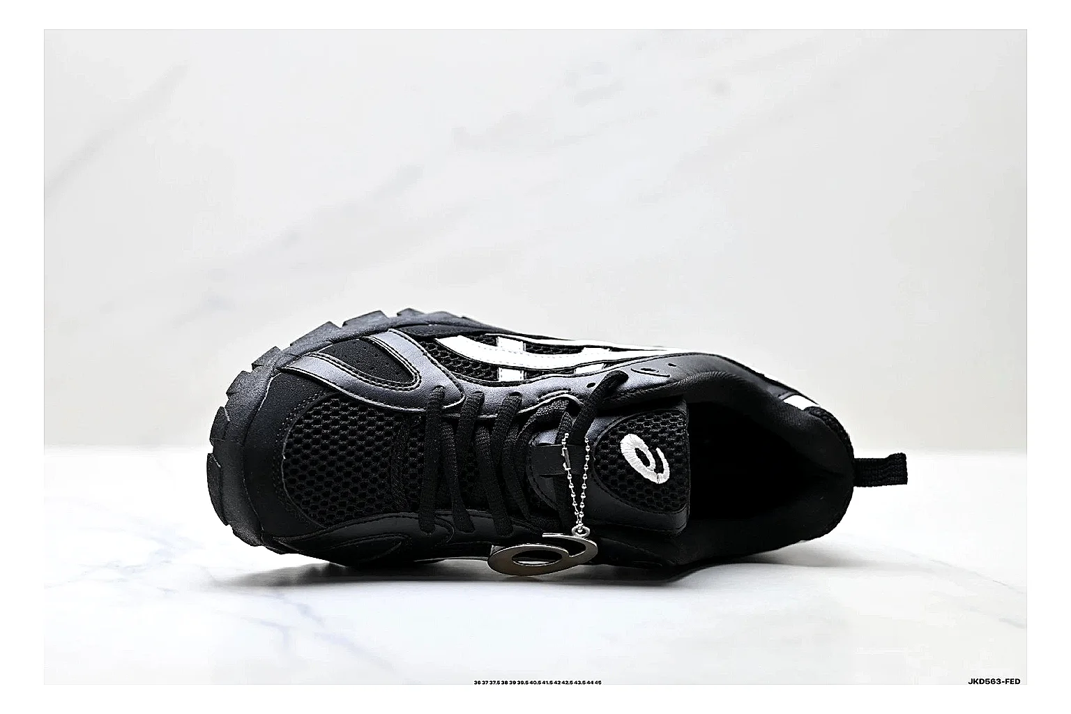Onitsuka Tiger Gel-Tru Black White Sneakers shopping brief image showing black white trail runner sneakers with mesh-leather texture, side-profile shape, upper panel lines, and outsole detail thumbnail 5
