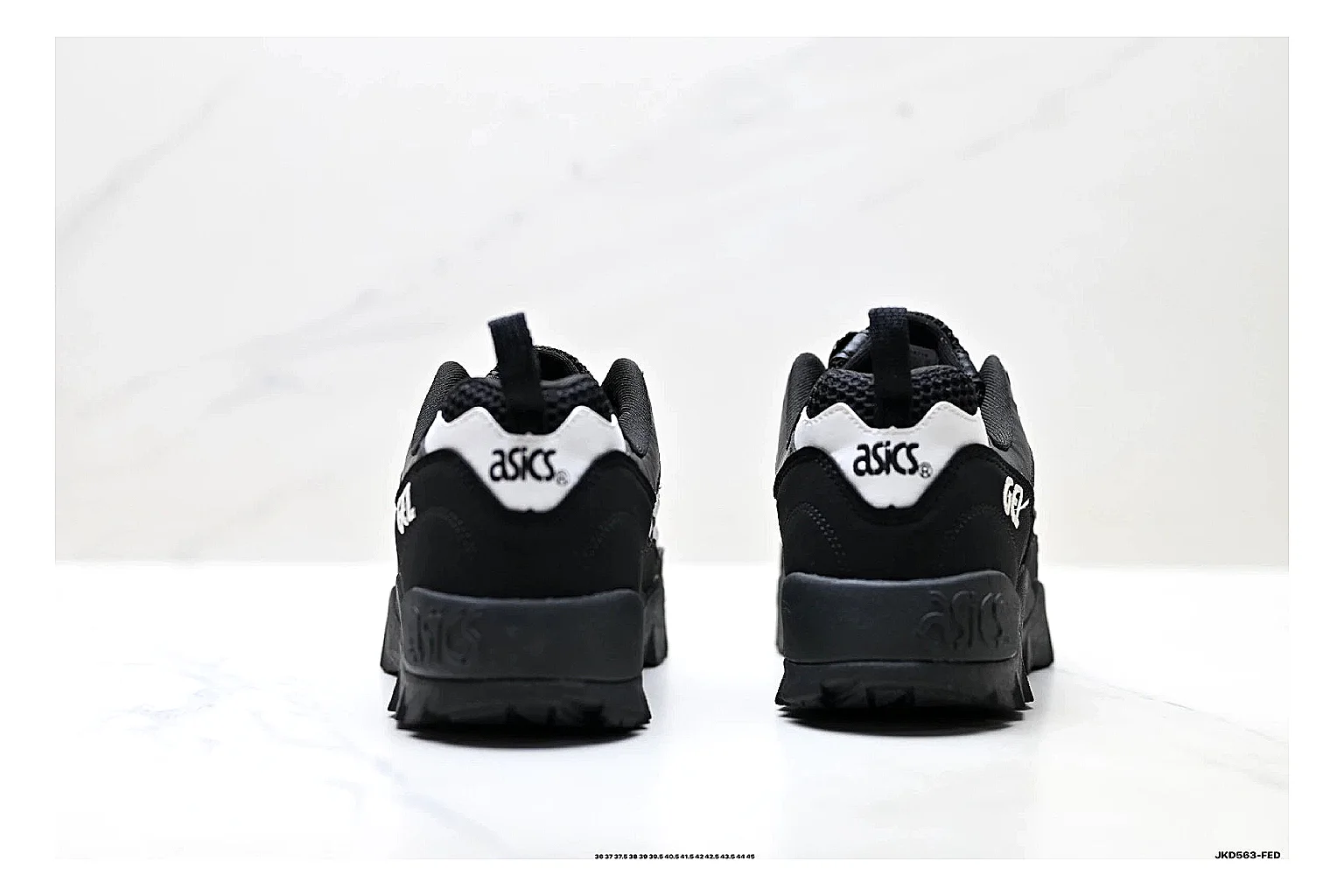 Onitsuka Tiger Gel-Tru Black White Sneakers shopping brief image showing black white trail runner sneakers with mesh-leather texture, side-profile shape, upper panel lines, and outsole detail thumbnail 6
