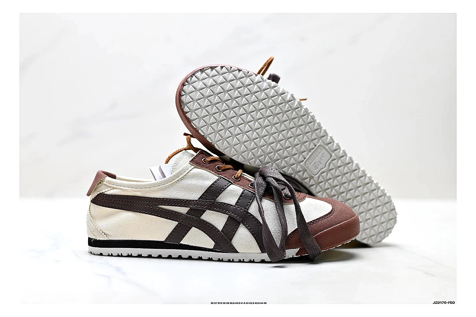Onitsuka Tiger Mexico 66 Brown Cream Sneakers shopping brief image showing brown cream low-top sneakers with leather texture, side-profile shape, upper panel lines, and outsole detail thumbnail 3
