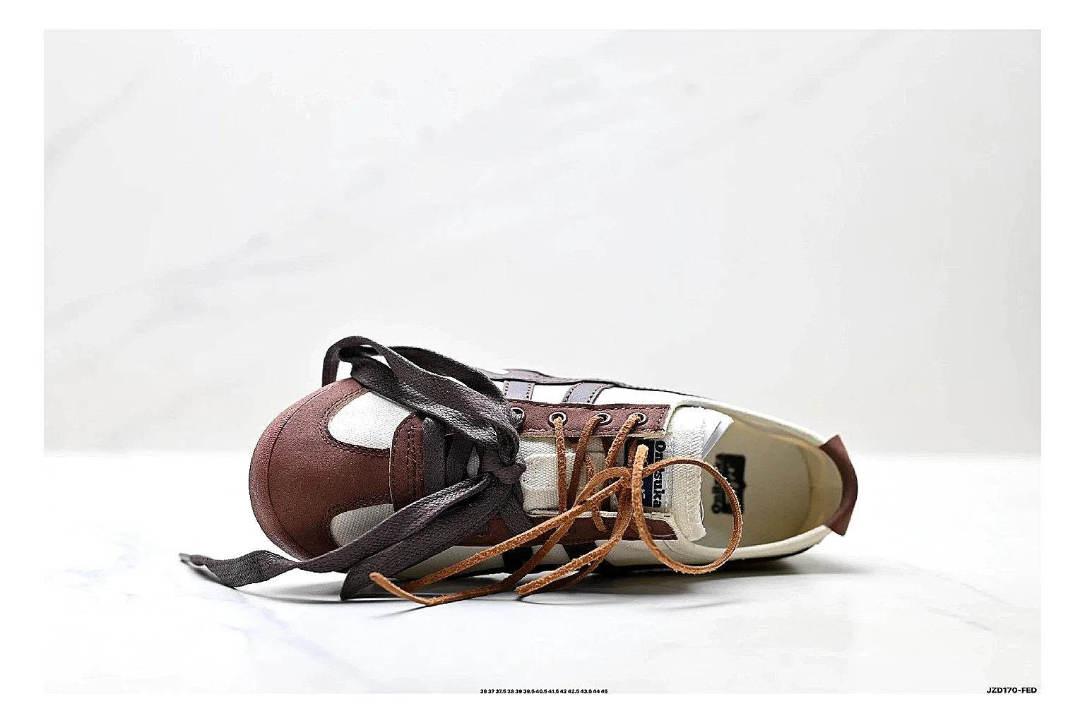 Onitsuka Tiger Mexico 66 Brown Cream Sneakers shopping brief image showing brown cream low-top sneakers with leather texture, side-profile shape, upper panel lines, and outsole detail thumbnail 5