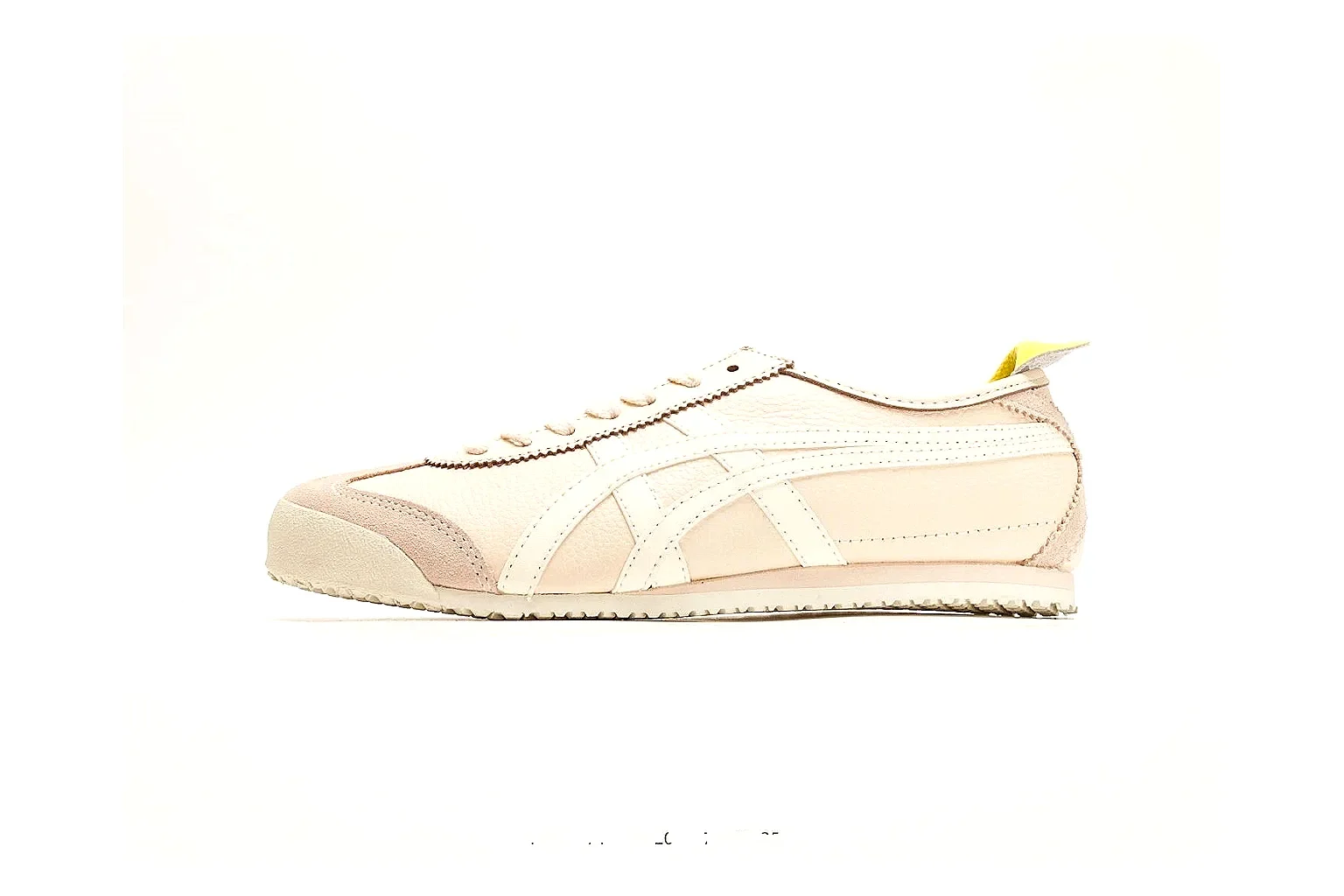 Onitsuka Tiger Mexico 66 Cream Yellow Sneakers shopping brief image showing cream yellow low-top sneakers with leather texture, side-profile shape, upper panel lines, and outsole detail