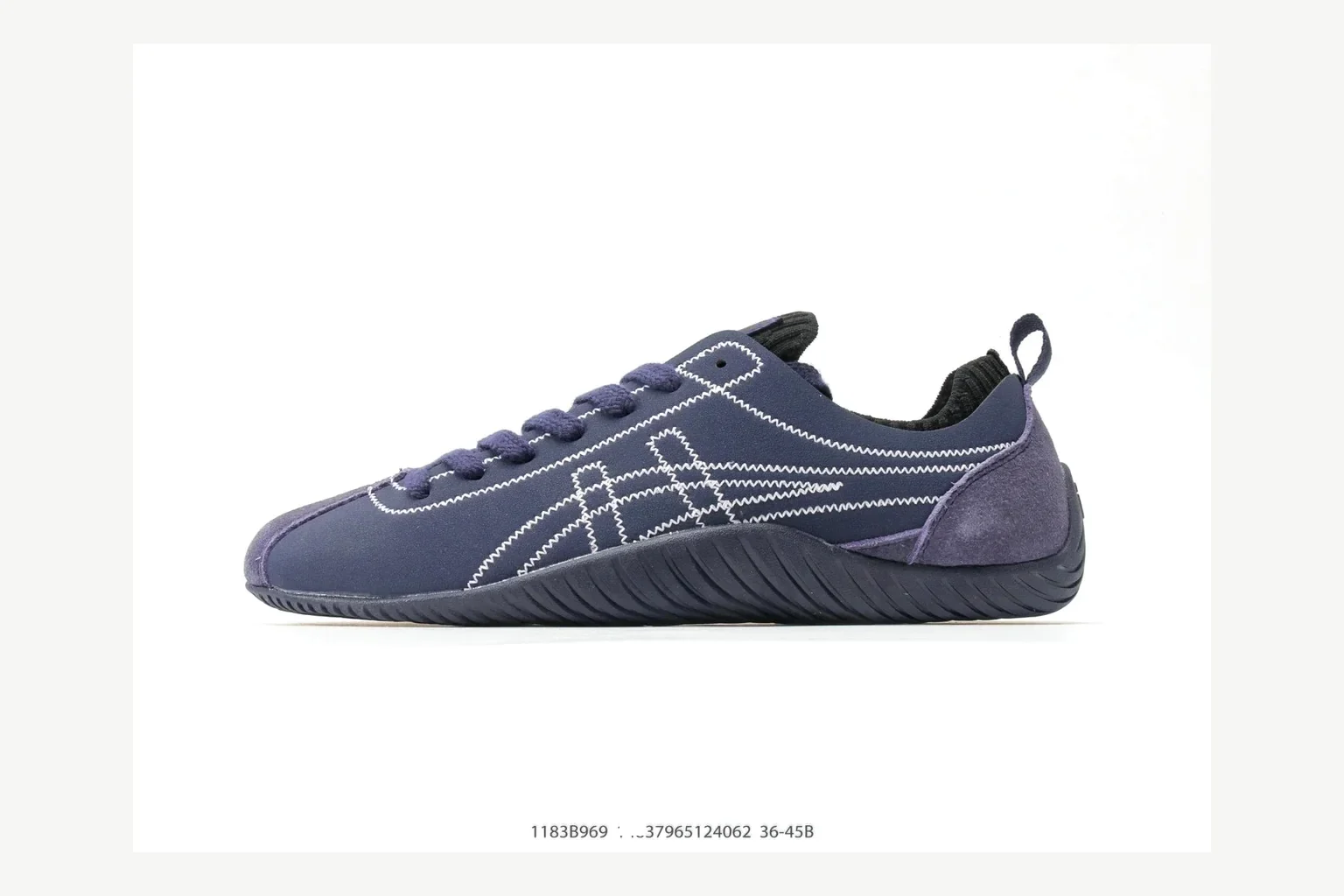 Onitsuka Tiger Navy Low Sneaker shopping brief image showing navy retro stripe low-top with mixed-material upper and low-profile shape