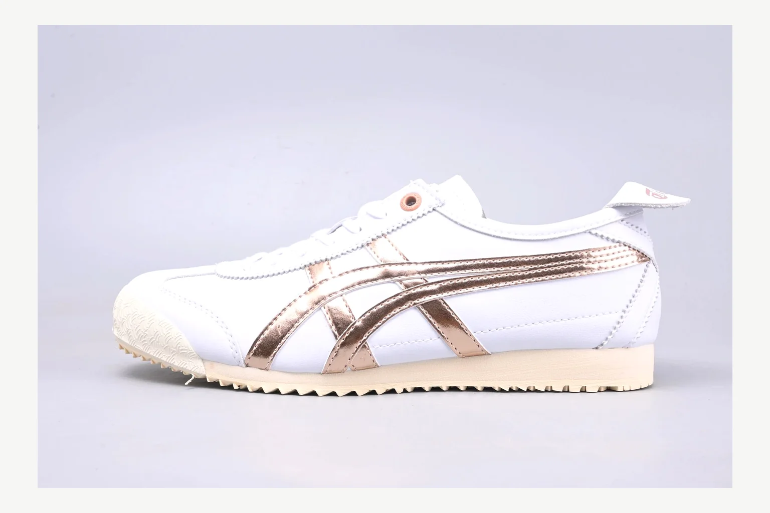 Onitsuka Tiger White Brown Sneaker shopping brief image showing white brown retro stripe low-top with mixed-material upper and low-profile shape