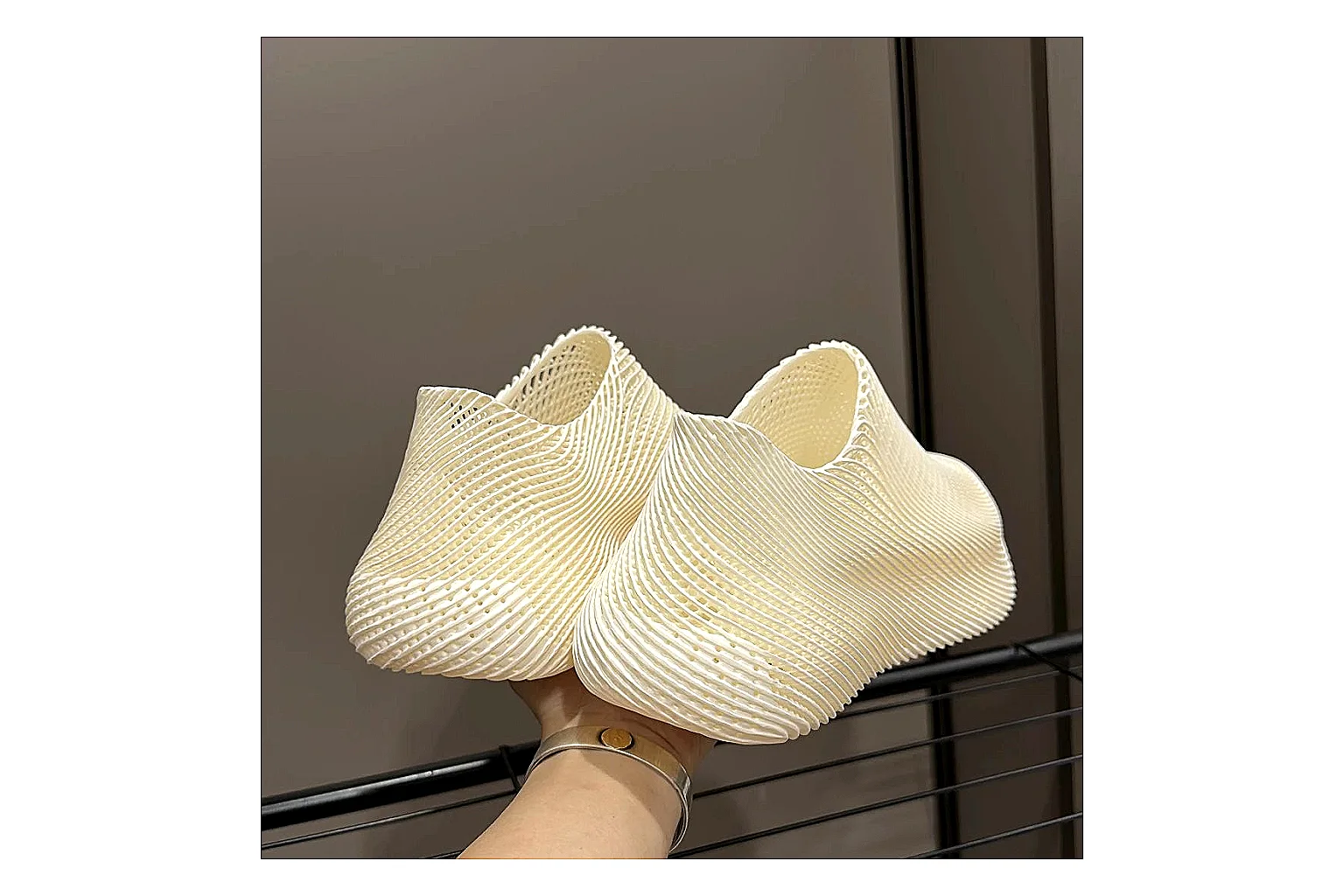 Other 4D Printed Cream Slip-On Sneakers shopping brief photo showing cream open-grid upper, seamless slip-on profile, sculpted sole, and soft futuristic casual shape thumbnail 2