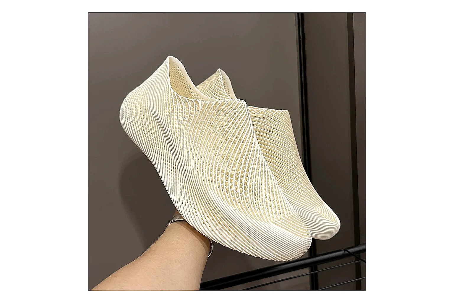 Other 4D Printed Cream Slip-On Sneakers shopping brief photo showing cream open-grid upper, seamless slip-on profile, sculpted sole, and soft futuristic casual shape thumbnail 5