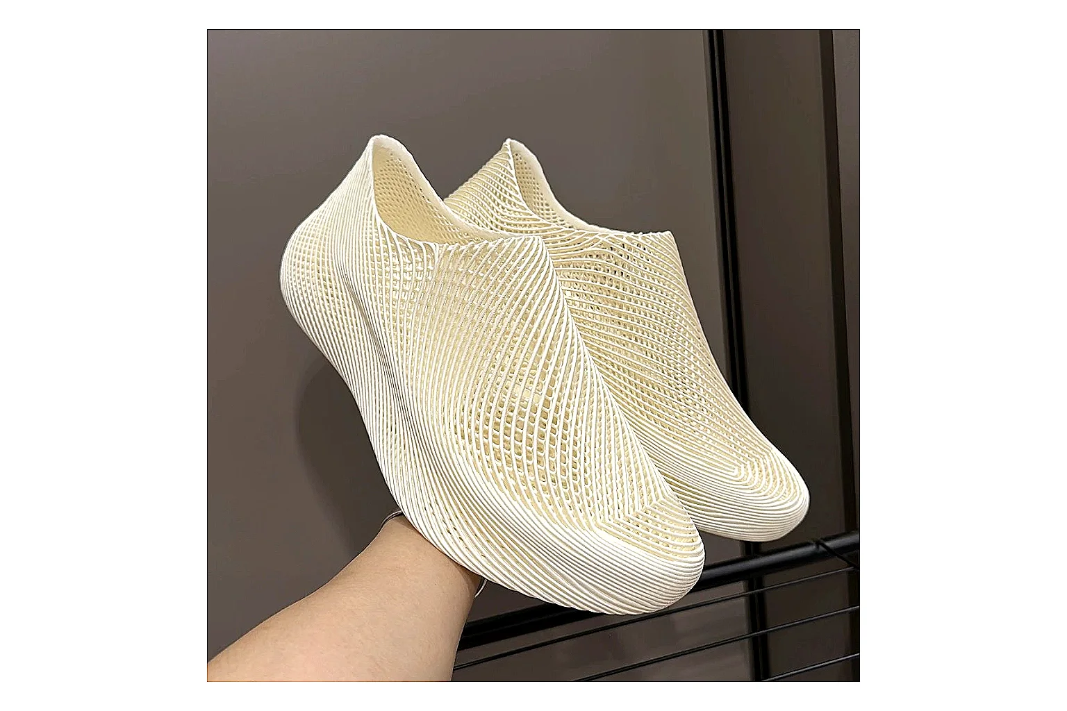 Other 4D Printed Cream Slip-On Sneakers shopping brief photo showing cream open-grid upper, seamless slip-on profile, sculpted sole, and soft futuristic casual shape thumbnail 6