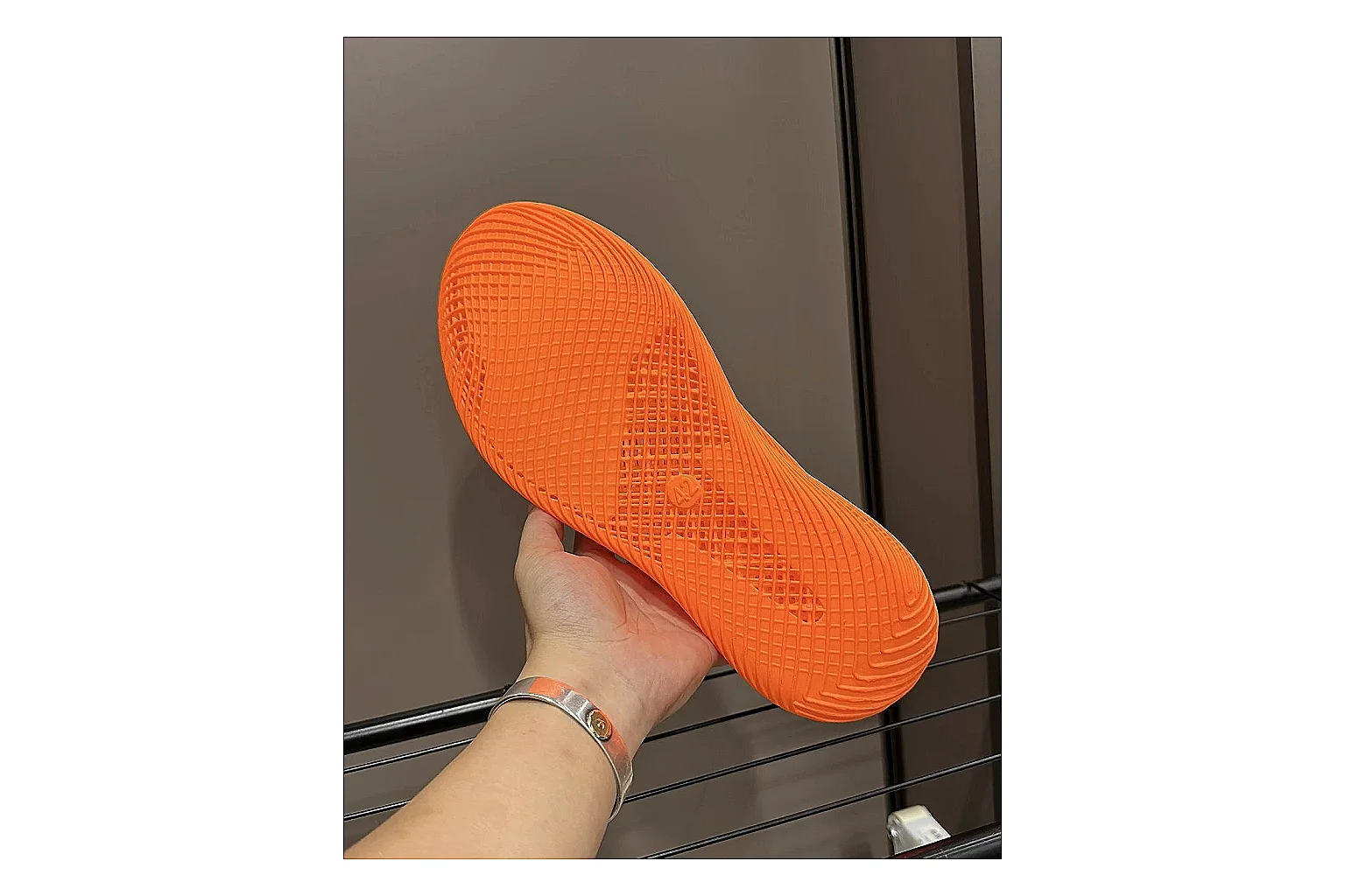 Other 4D Printed Orange Slip-On Sneakers shopping brief photo showing orange open-grid upper, seamless slip-on shape, sculpted sole, and futuristic lightweight profile thumbnail 3