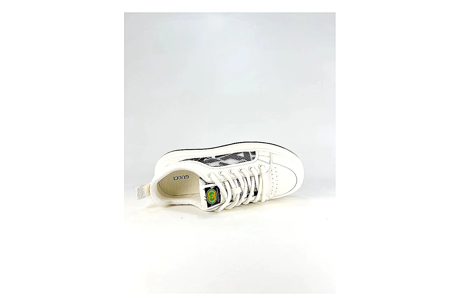 Low Runner White Black Sneaker shopping brief photo showing white black synthetic low-top upper, minimal runner shape, clean panels, and casual sole thumbnail 3