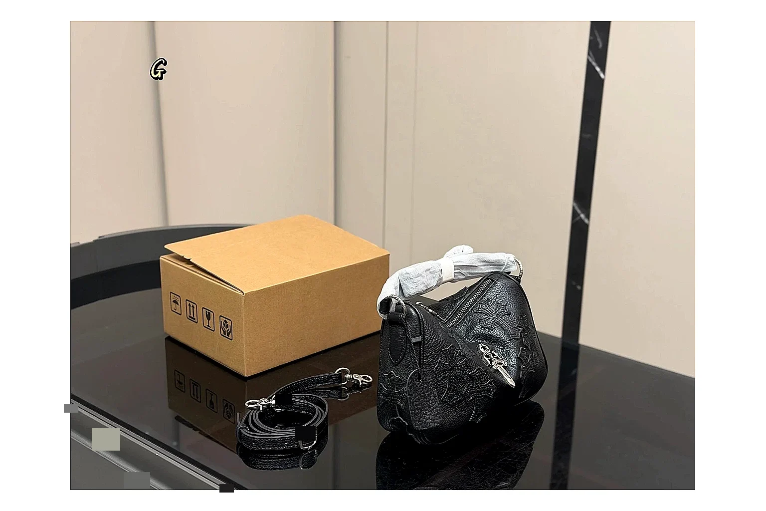 Mini Top Handle Black Bag shopping brief photo showing black leather compact bag body, structured handle, clean top-handle shape, and simple hardware