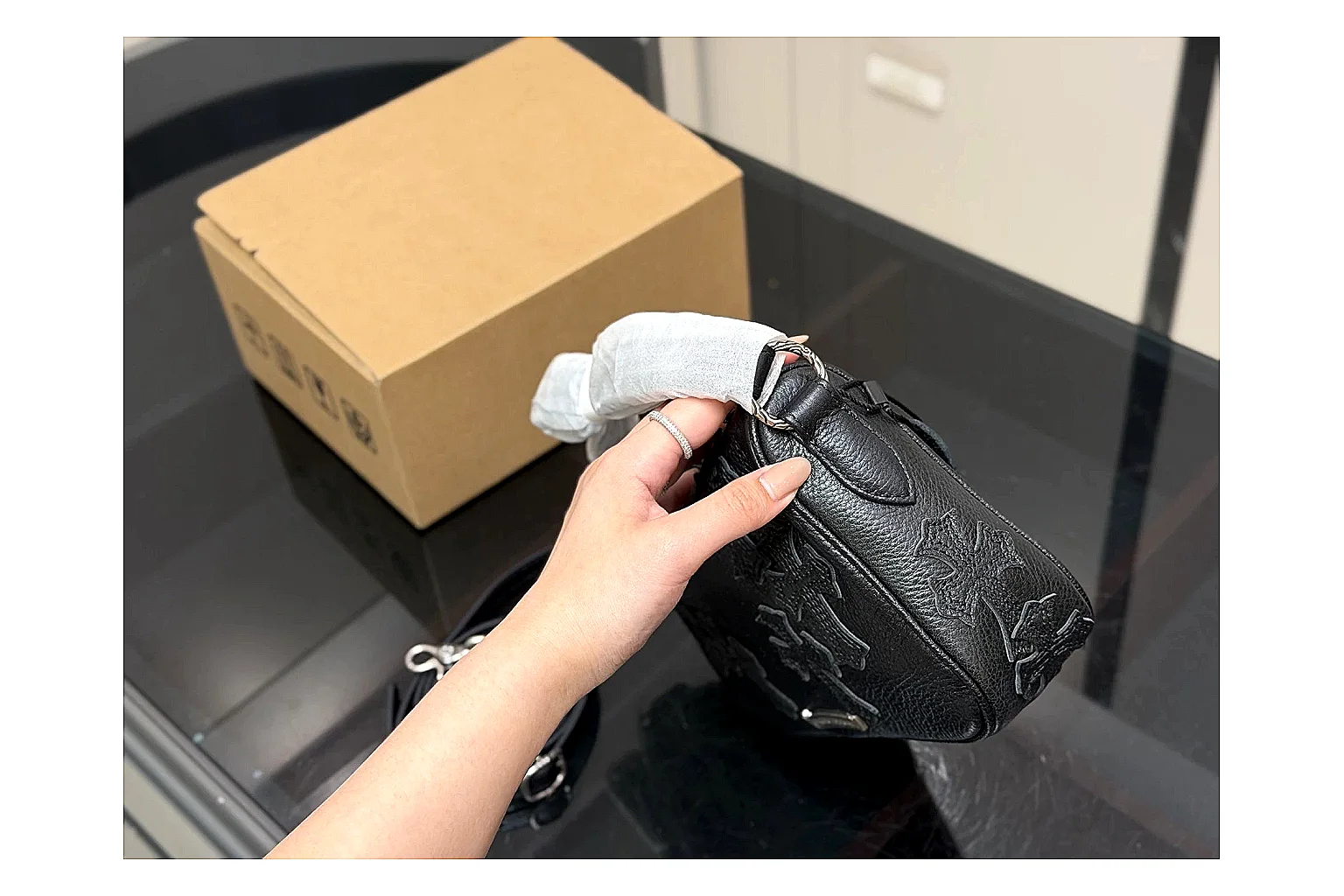 Mini Top Handle Black Bag shopping brief photo showing black leather compact bag body, structured handle, clean top-handle shape, and simple hardware thumbnail 3
