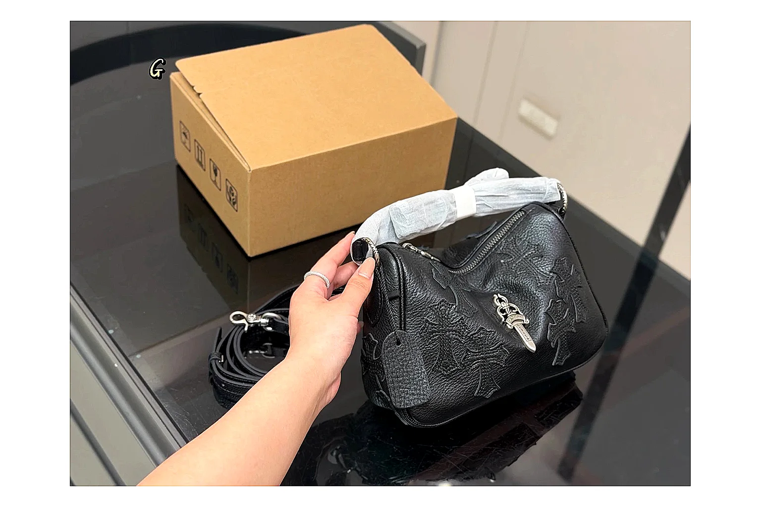 Mini Top Handle Black Bag shopping brief photo showing black leather compact bag body, structured handle, clean top-handle shape, and simple hardware thumbnail 4