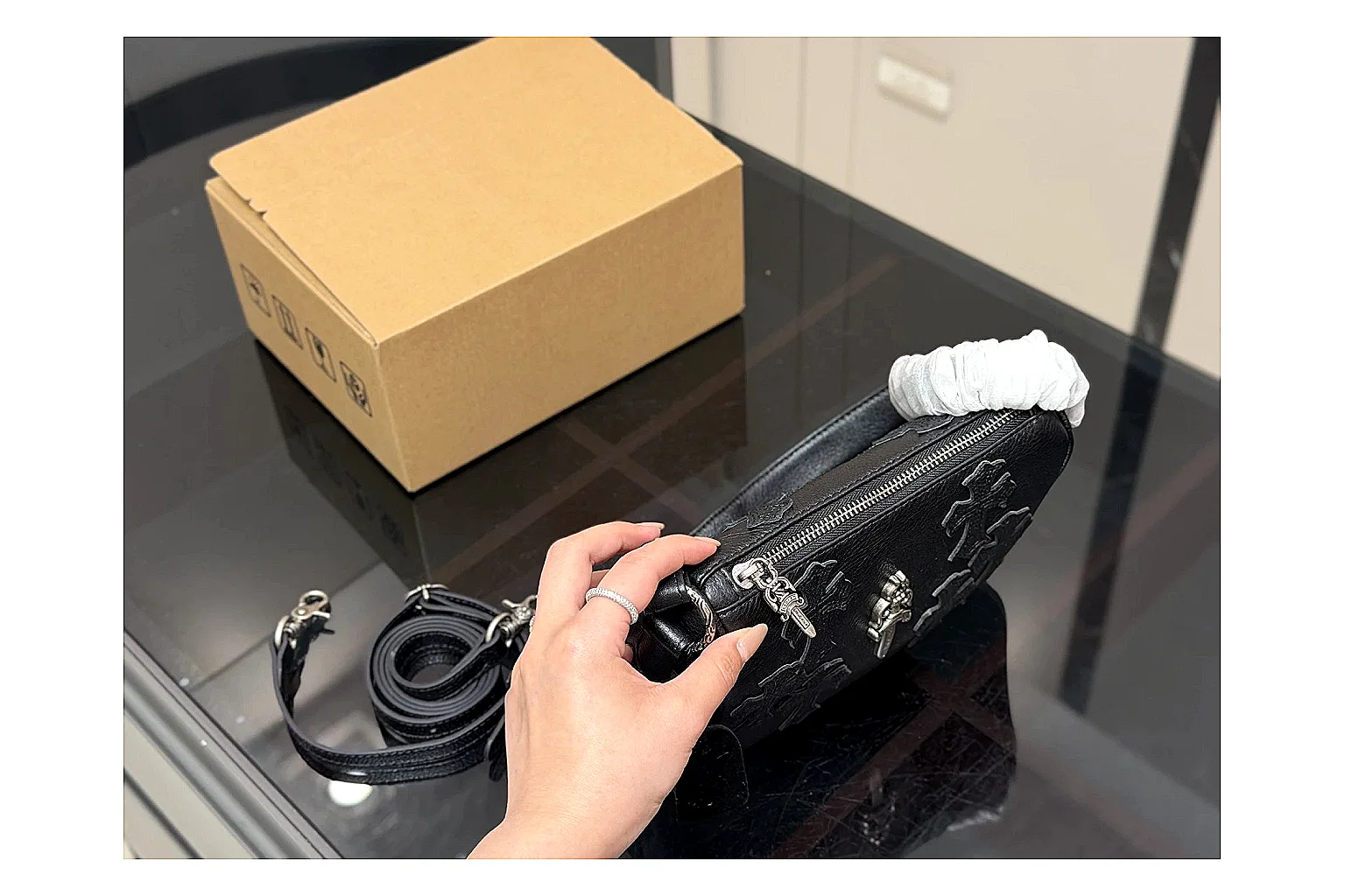 Mini Top Handle Black Bag shopping brief photo showing black leather compact bag body, structured handle, clean top-handle shape, and simple hardware thumbnail 5
