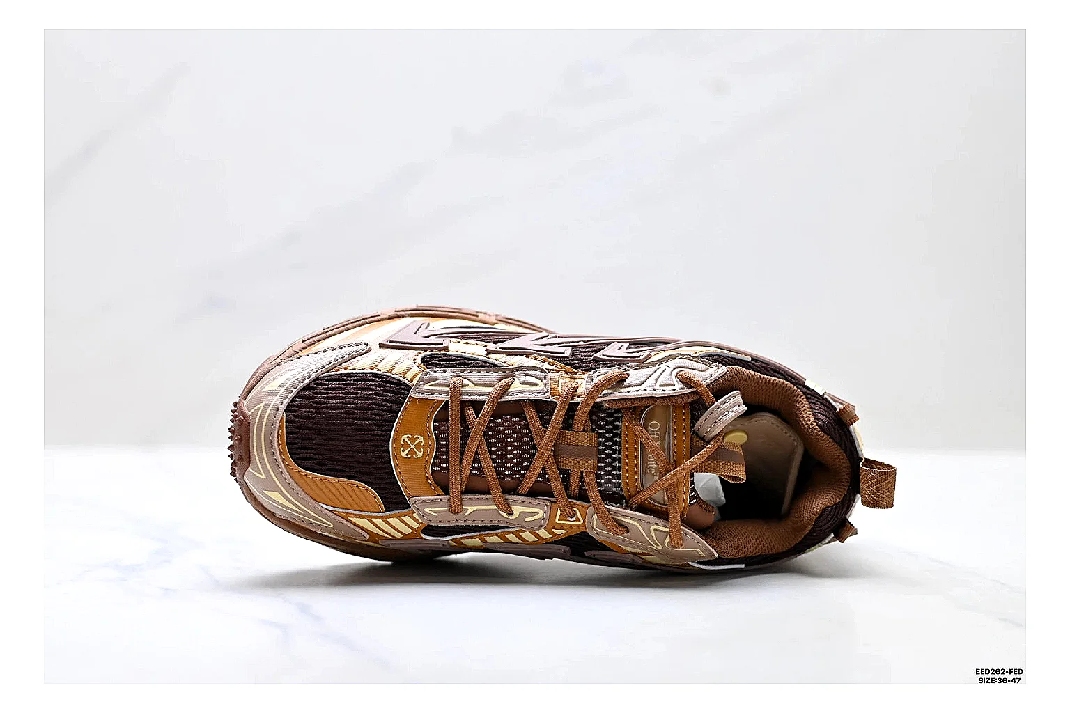 Trail Runner Brown Gold Sneaker shopping brief photo showing brown gold mesh-suede runner upper, rugged trail profile, protective overlays, and traction sole thumbnail 4
