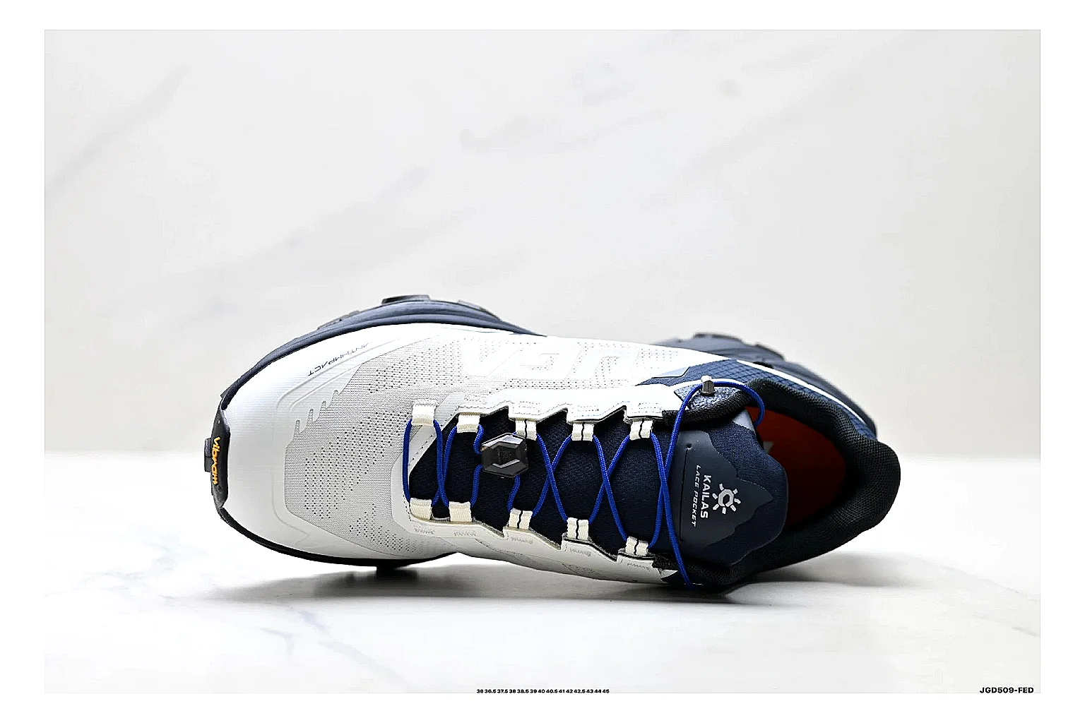 Trail Runner White Navy Sneaker shopping brief photo showing white navy mesh-leather runner upper, rugged trail shape, protective overlays, and traction sole thumbnail 4