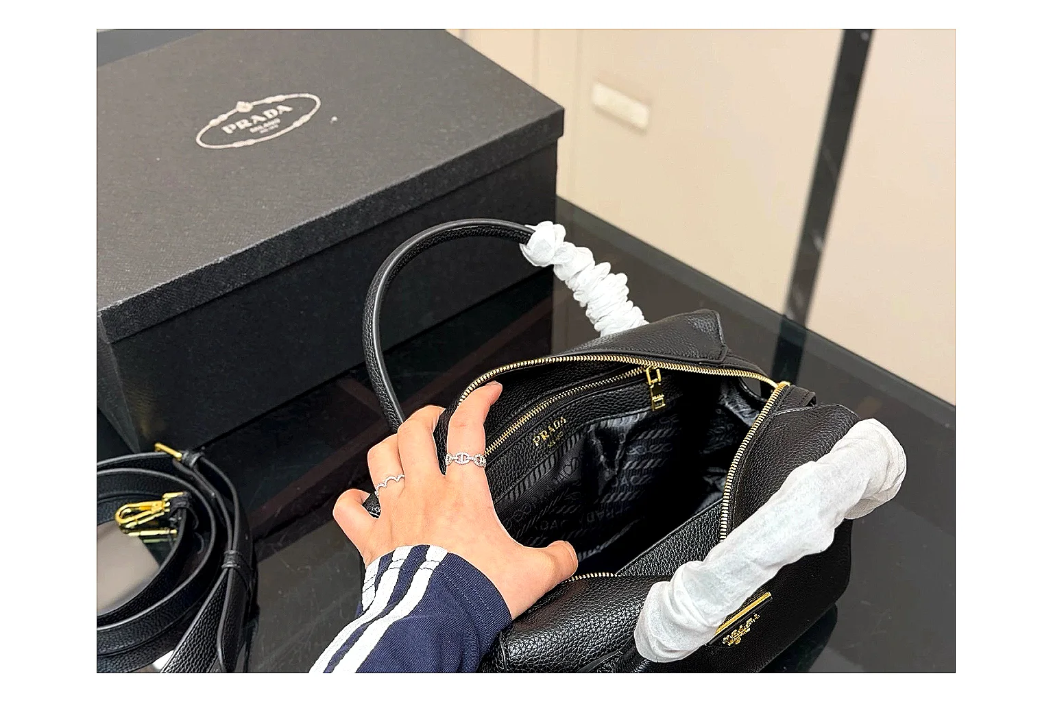 Prada Mini Top Handle Black shopping brief photo showing black leather mini bag body, structured top handle, compact silhouette, and clean metal hardware thumbnail 2