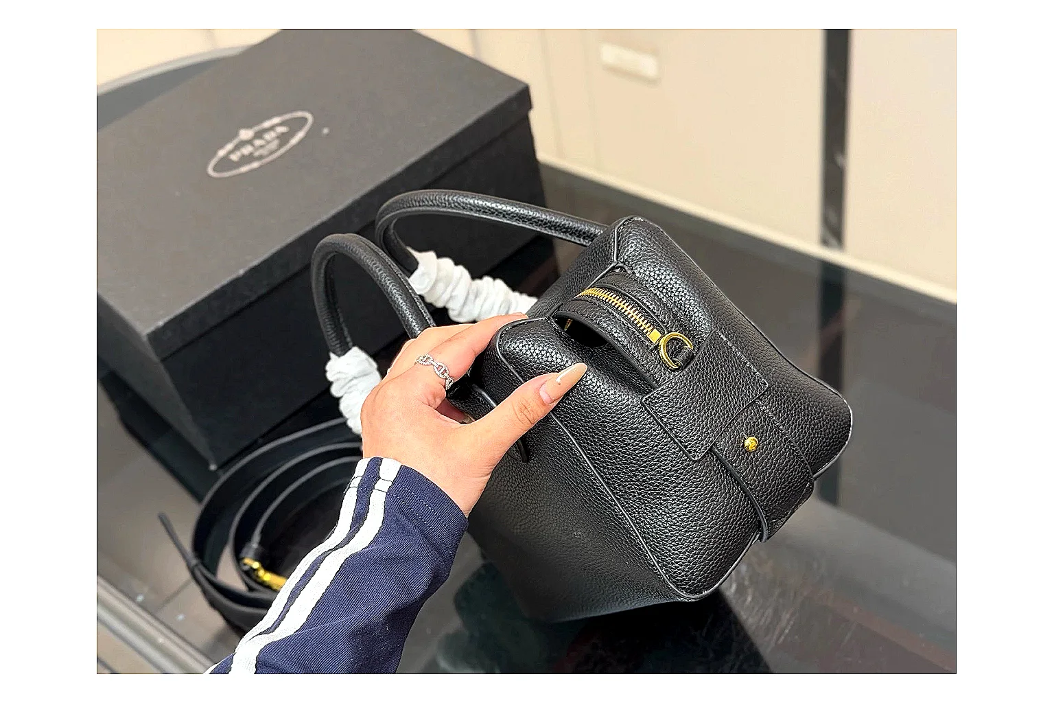 Prada Mini Top Handle Black shopping brief photo showing black leather mini bag body, structured top handle, compact silhouette, and clean metal hardware thumbnail 3