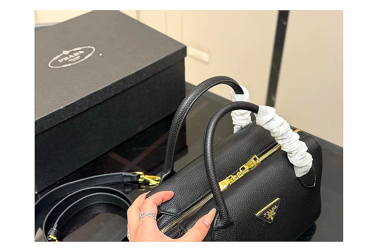 Prada Mini Top Handle Black shopping brief photo showing black leather mini bag body, structured top handle, compact silhouette, and clean metal hardware thumbnail 5