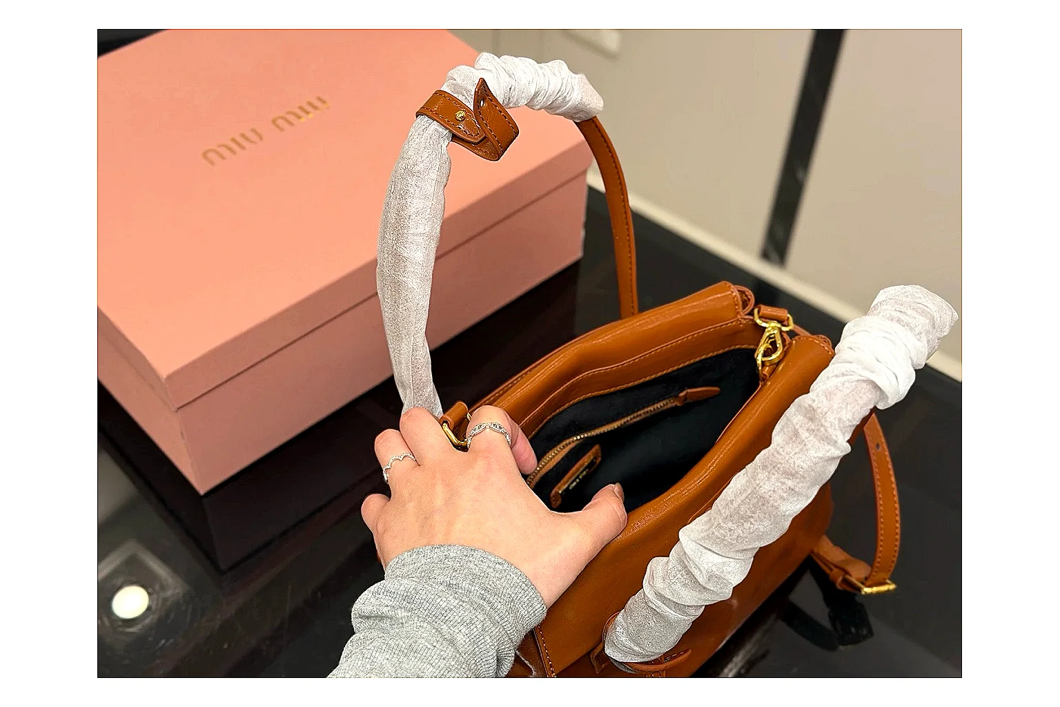 Prada Mini Top Handle Orange Brown shopping brief photo showing orange brown leather mini bag body, structured top handle, compact shape, and clean hardware details thumbnail 2