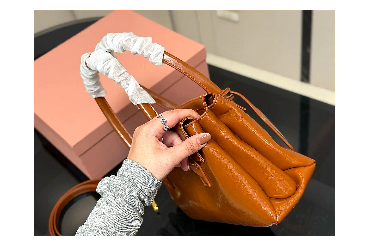 Prada Mini Top Handle Orange Brown shopping brief photo showing orange brown leather mini bag body, structured top handle, compact shape, and clean hardware details thumbnail 3