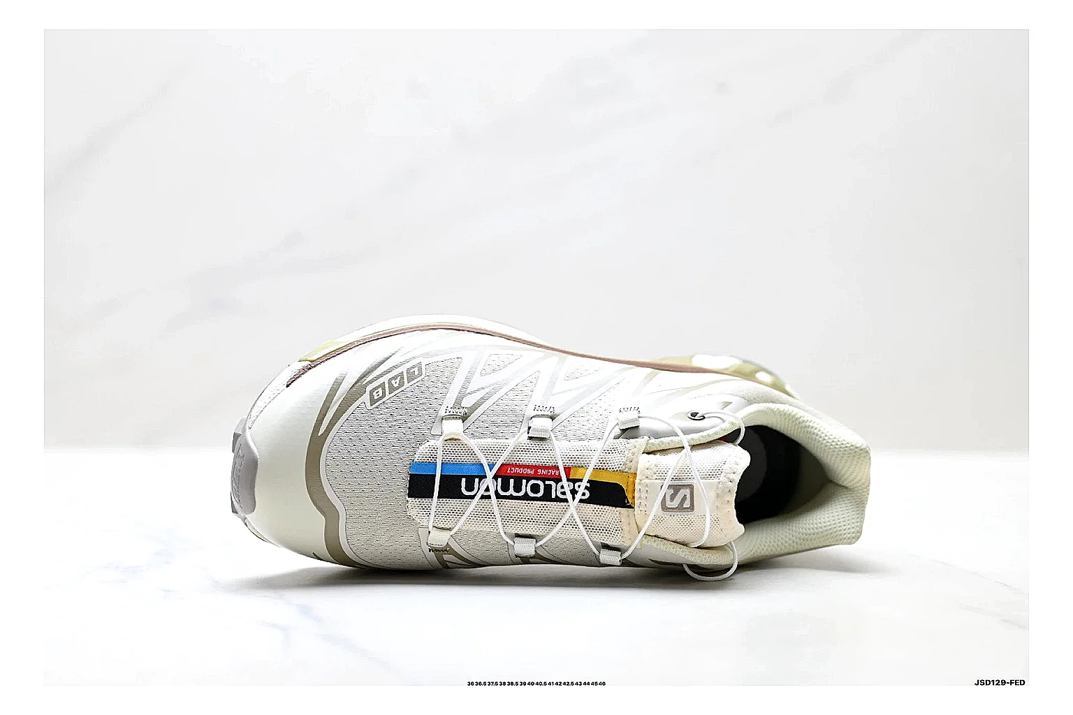 Salomon Xt Runner White Gold shopping brief photo showing white mesh trail-runner upper, gold accents, speed-lace style structure, and rugged sole thumbnail 4