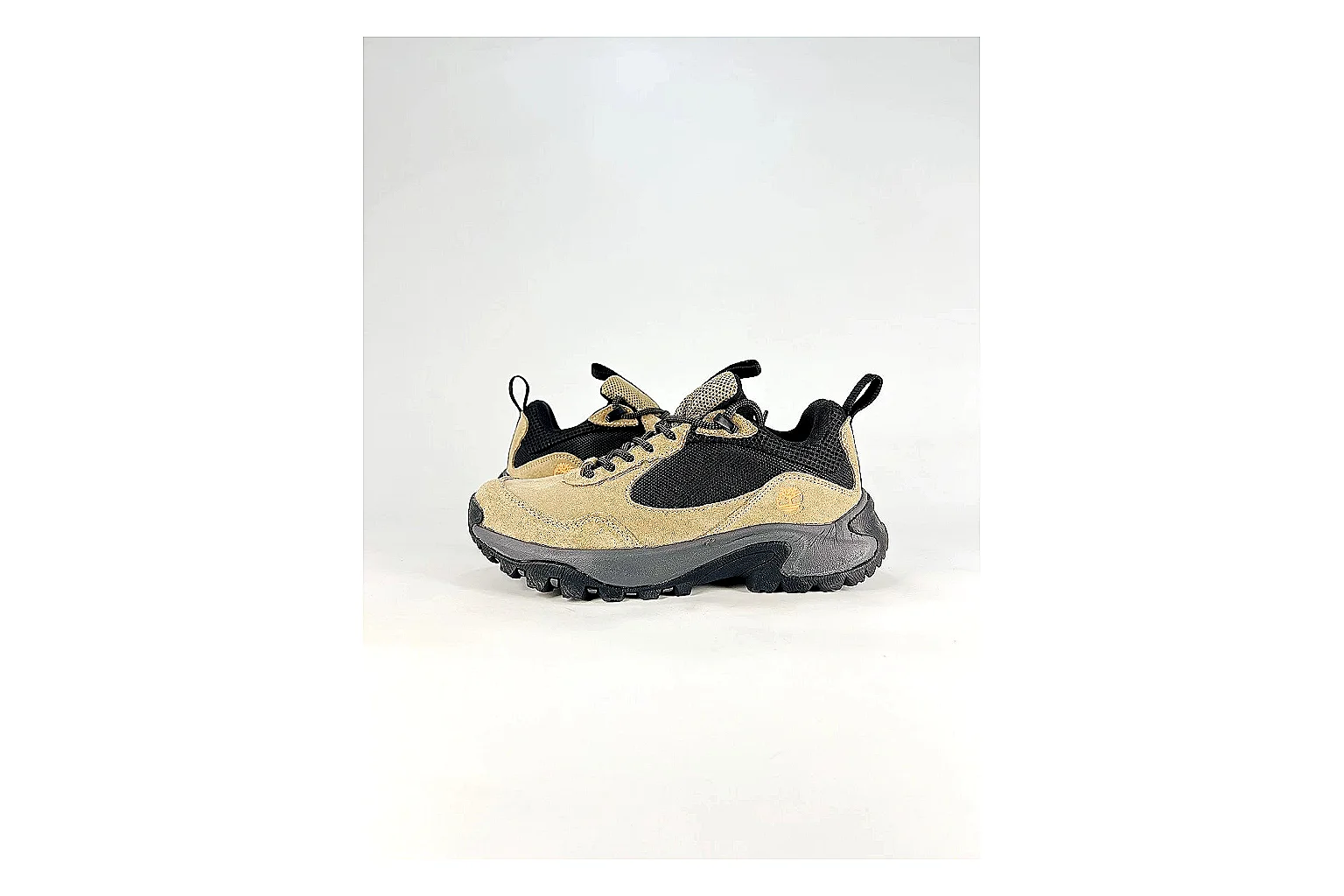 Timberland Motion Access Beige Black Sneakers shopping brief image showing beige black outdoor sneakers with mesh-leather texture, side-profile shape, upper panel lines, and outsole detail