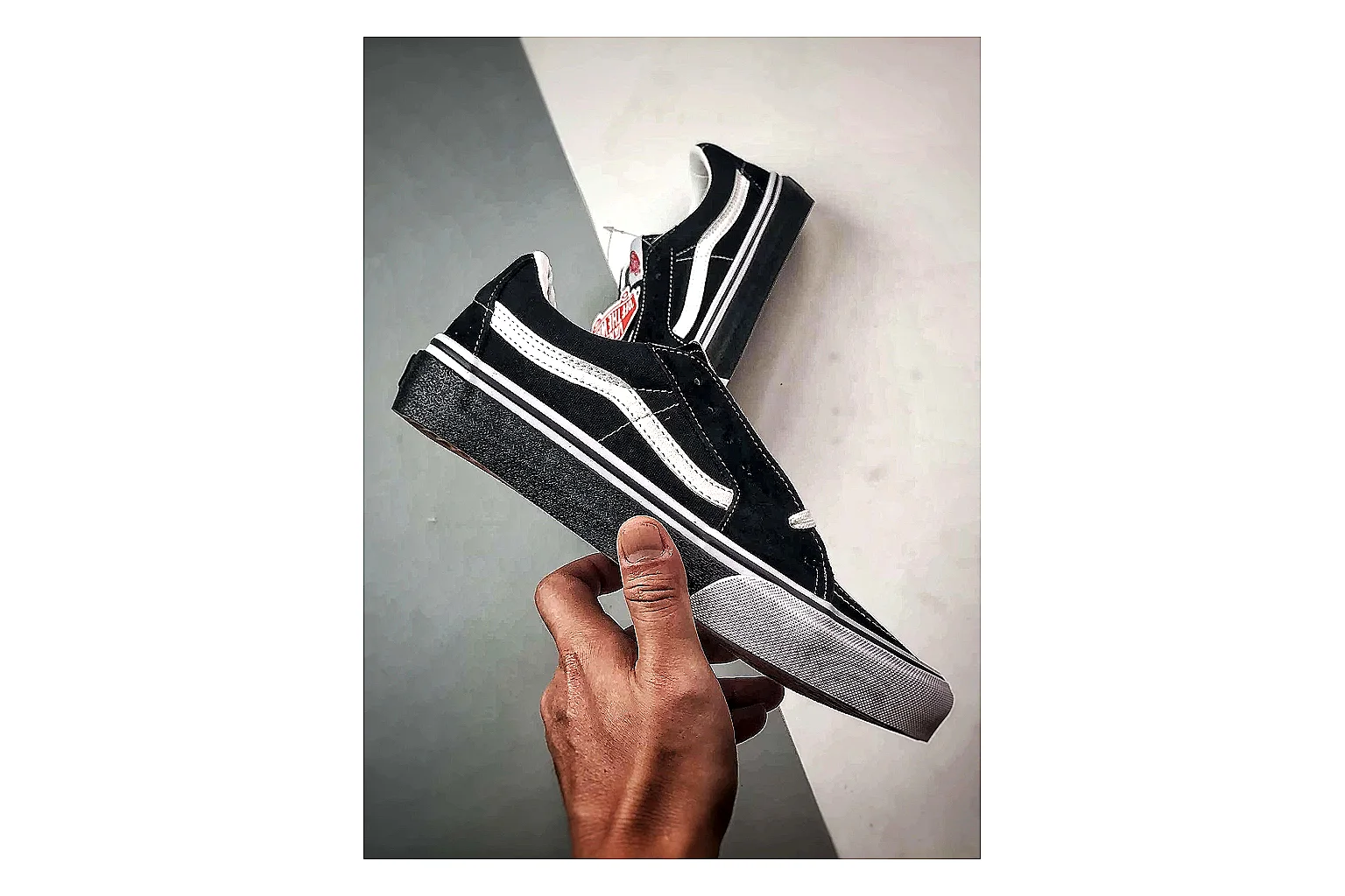 Vans Old Skool Black White shopping brief photo showing black canvas-suede low-top upper, white side stripe, padded collar, and classic vulcanized skate sole thumbnail 2