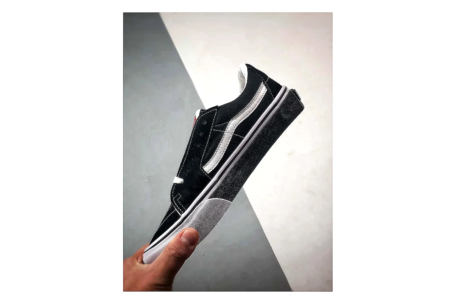 Vans Old Skool Black White shopping brief photo showing black canvas-suede low-top upper, white side stripe, padded collar, and classic vulcanized skate sole thumbnail 6